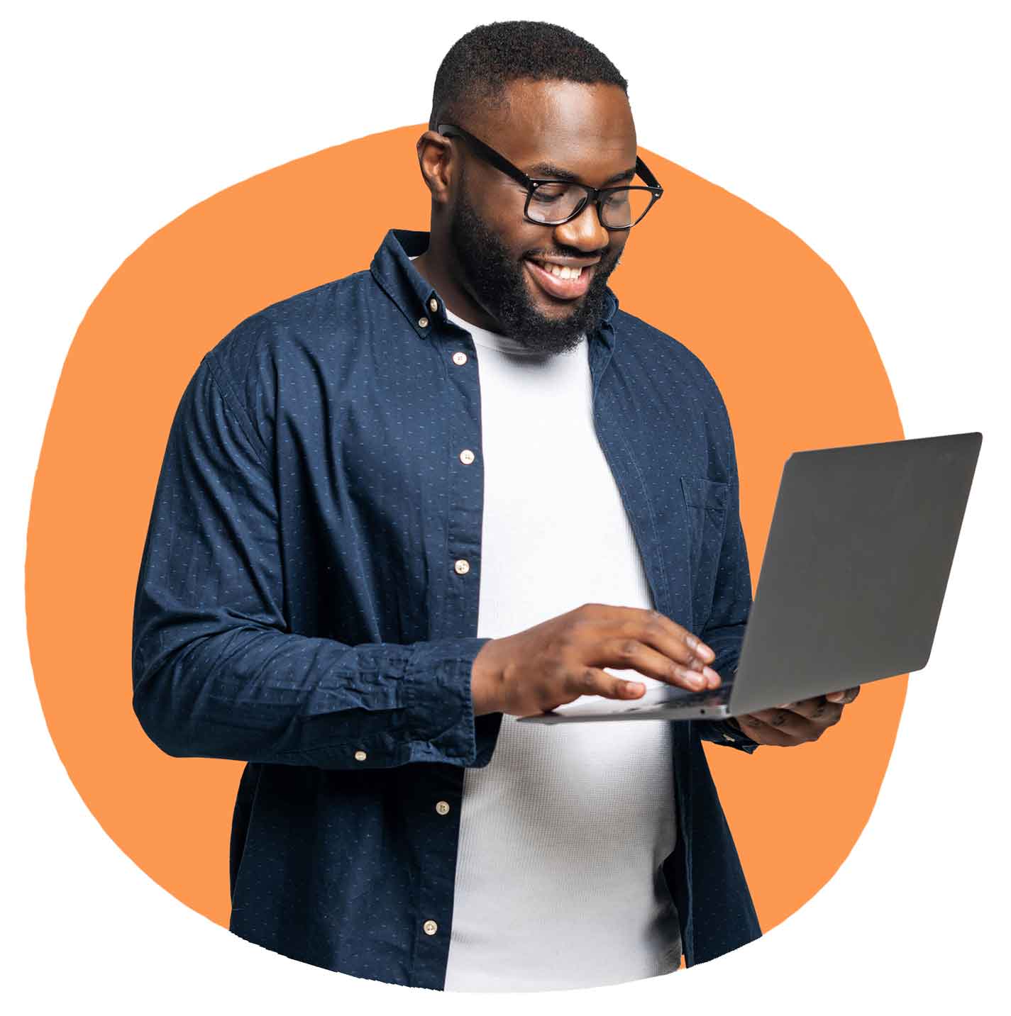 Smiling man holding a laptop